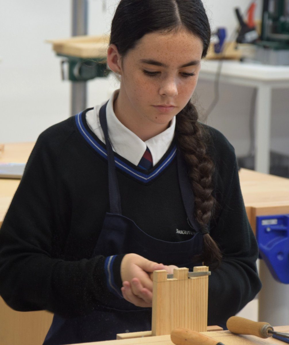 Pupil working in the design and technology workshop