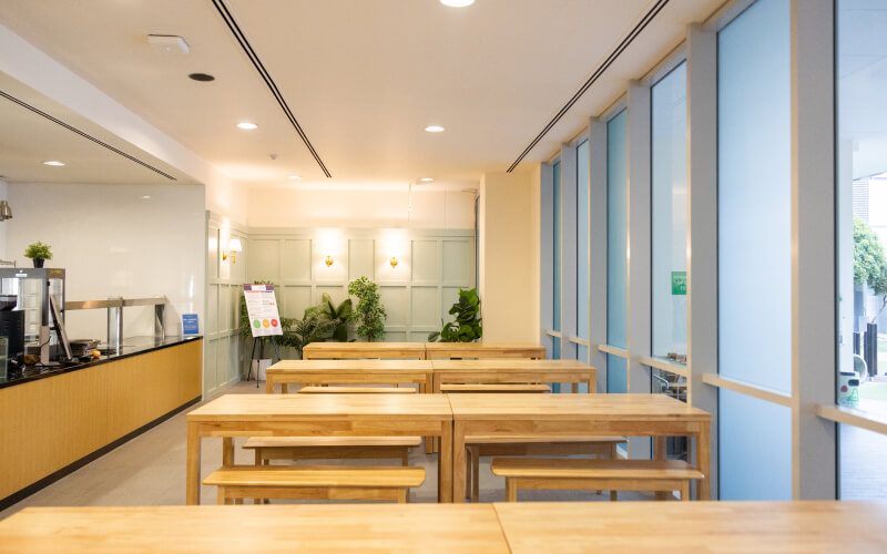 Dining area with long wooden tables