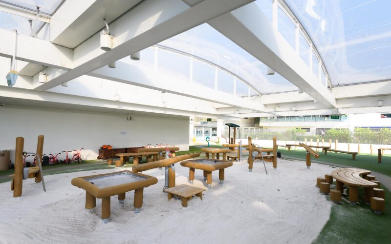 Covered sand play area for the youngest pupils