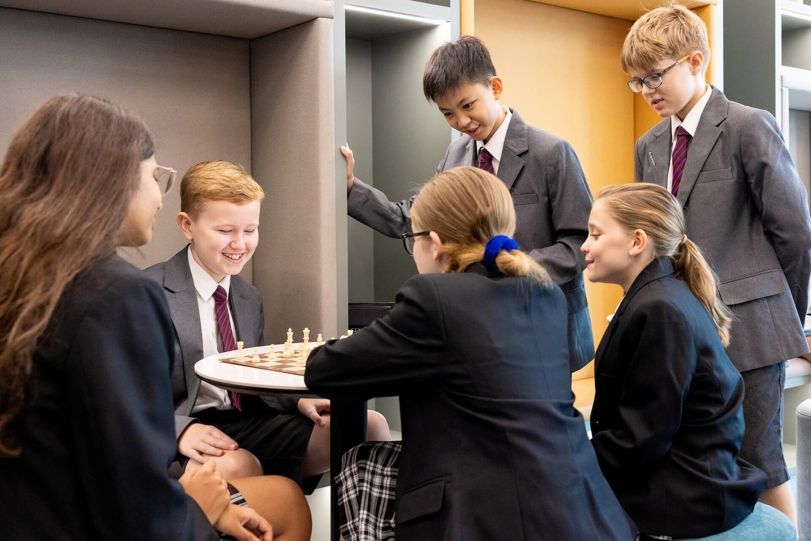 Senior pupils playing chess