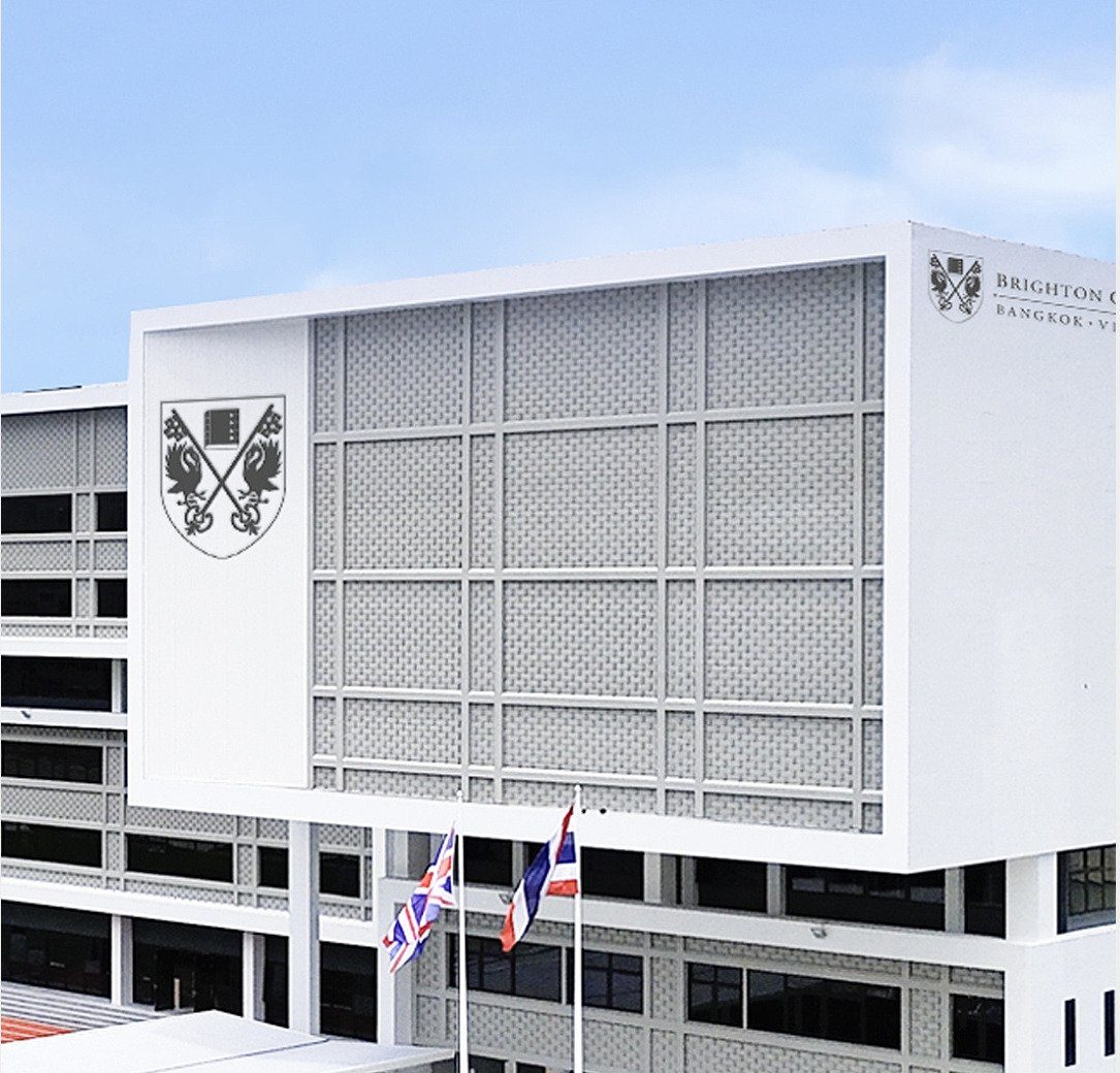Main building of Brighton College Bangkok Vibhavadi with the school crest